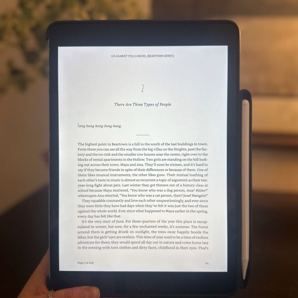 My Kindle Unlimited Review (2 Years Later) cover image which shows an iPad with a book pulled up on the Kindle app.