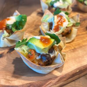 A close up of taco wonton cups.