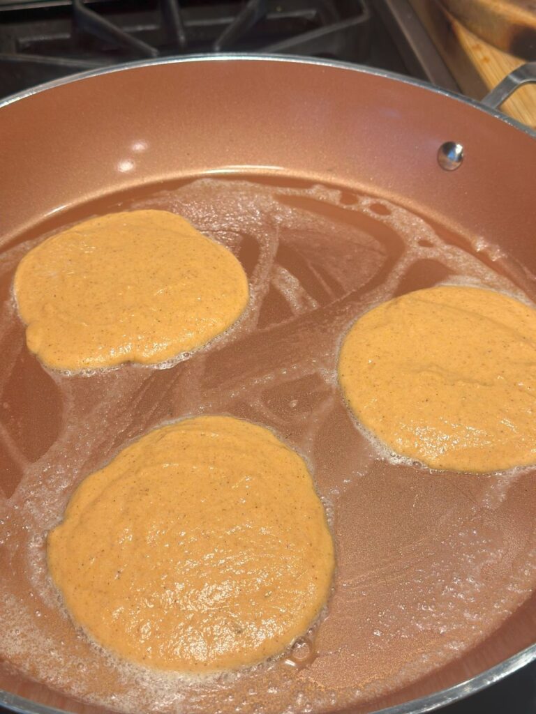 Pancakes Cooking In Pan