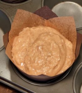 A close up of the batter in the wrapper.