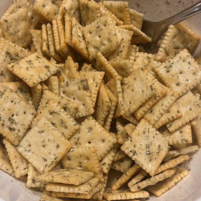 Crackers with Seasoned Oil Mixture in Bowl