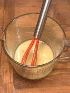 Seasoned Oil Mixture in Measuring Cup