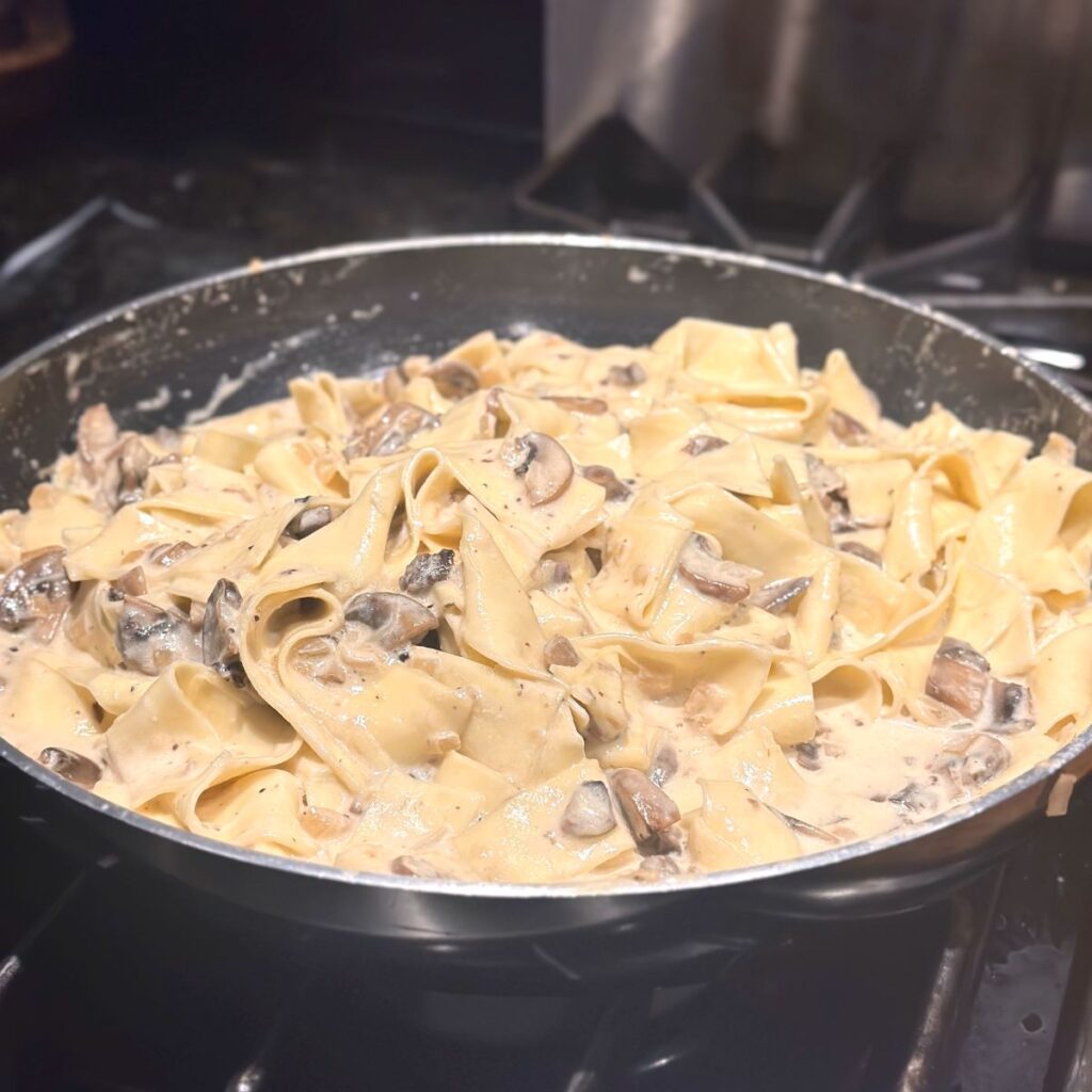 Creamy Mushroom Truffle Butter Pappardelle Pasta on the Stove