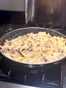 Creamy Mushroom Truffle Butter Pappardelle Pasta on the Stove