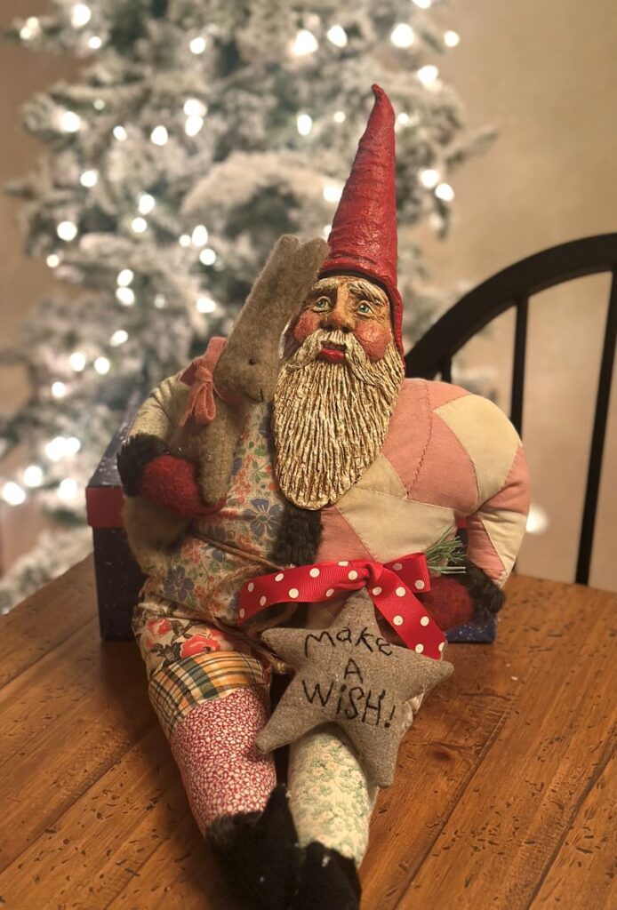 Debra Schoch Patchwork Santa Claus Holding an Easter Bunny