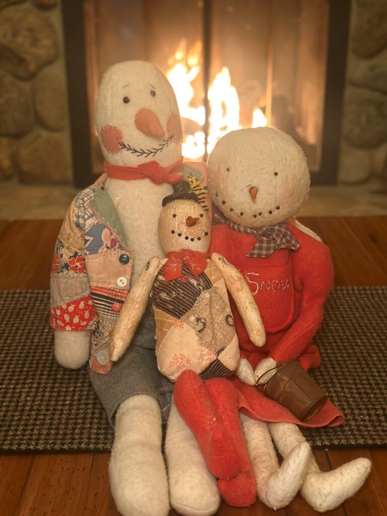 Debra Schoch Snowman Family in Front of the Fireplace
