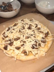 Adding Mushrooms and a Little More Cheese