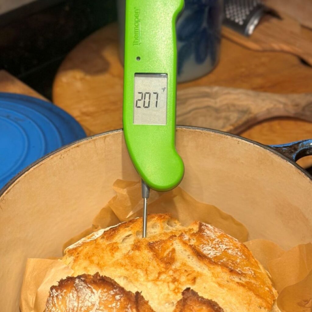 Thermapen ONE Review: Is This the Best Thermometer for Home Cooks? Cover Image | A photo of the Thermapen ONE in a loaf of freshly-baked bread.