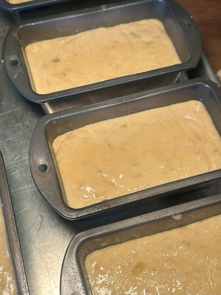 Banana Bread Batter in Mini Loaf Pans Ready To Be Baked